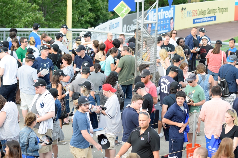 Thousands of Direwolves and Game of Thrones fans line up for a chance to get George RR Martin's autograph prior to the game (Robert M Pimpsner/Pinstriped Prospects)
